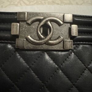 CHANEL Black Quilted Bag with Silver Logo